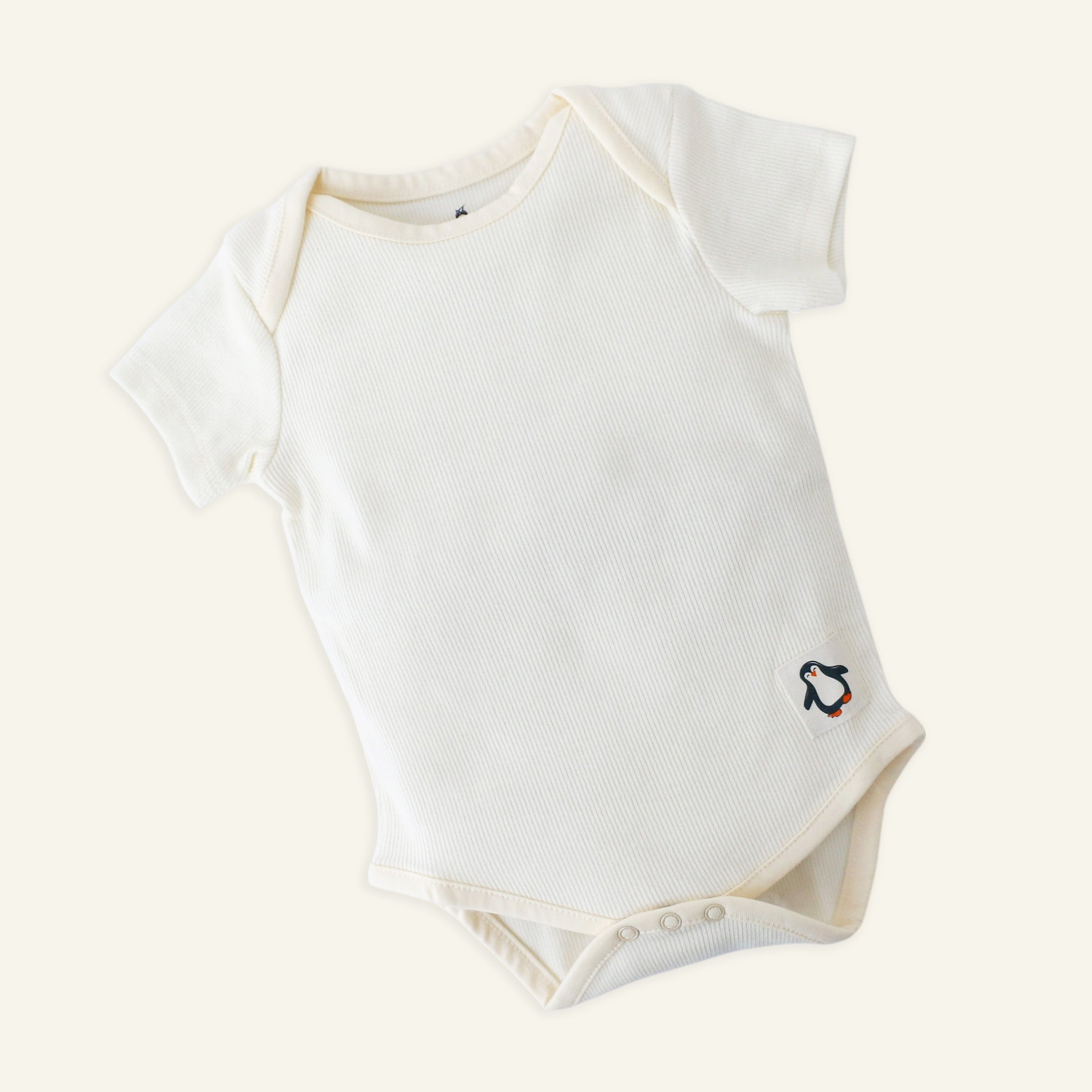 Baby Bodysuit (0–12 Months) Soft Ivory – Honcho Baby