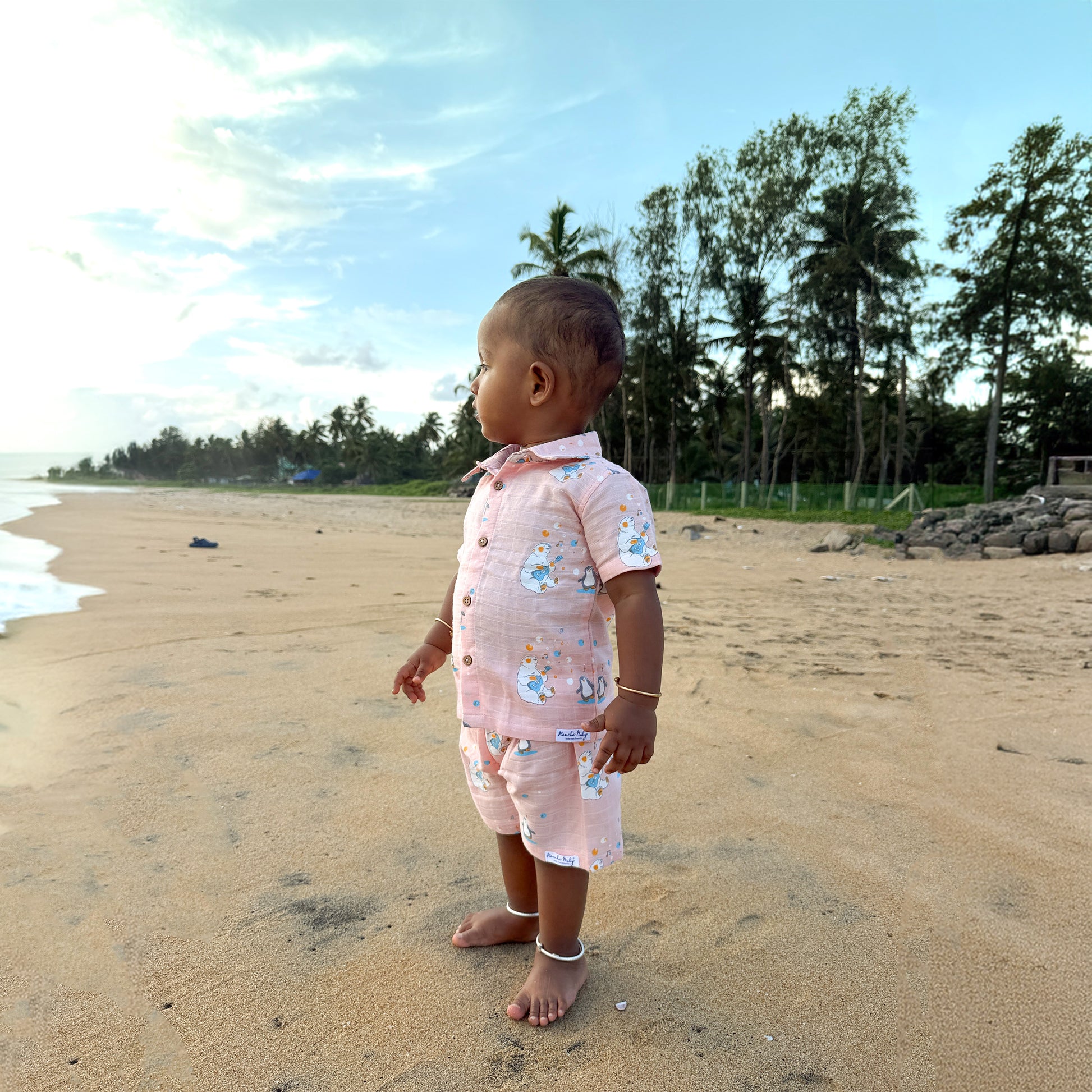 Muslin baby clothes set with playful animal print design