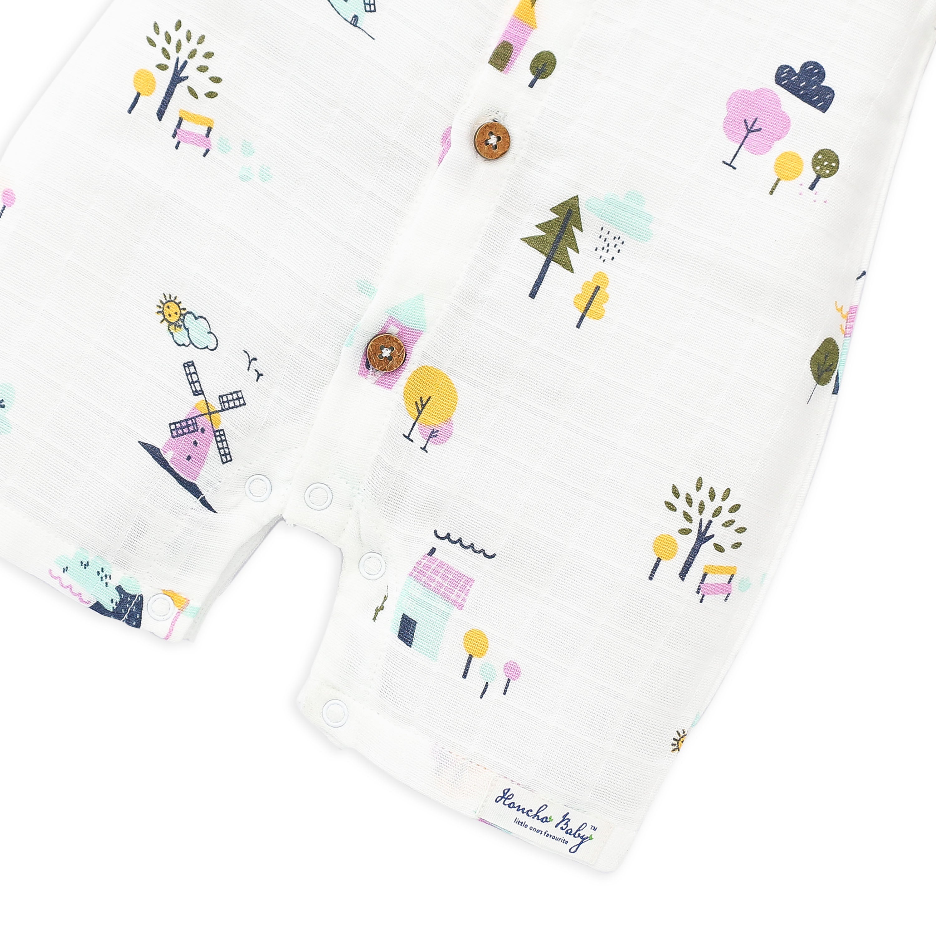 Secure snap button closures and Honcho Baby branding on organic baby romper