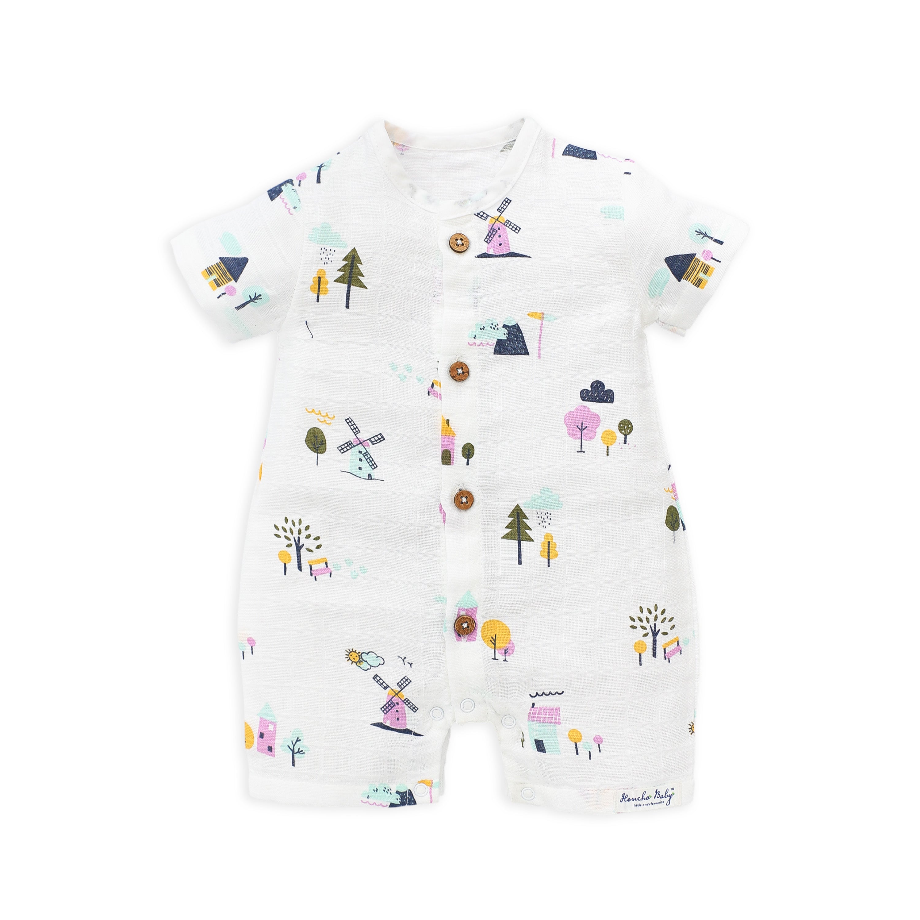 Organic muslin baby romper with colorful windmill print - front view showing button closure and short sleeves
