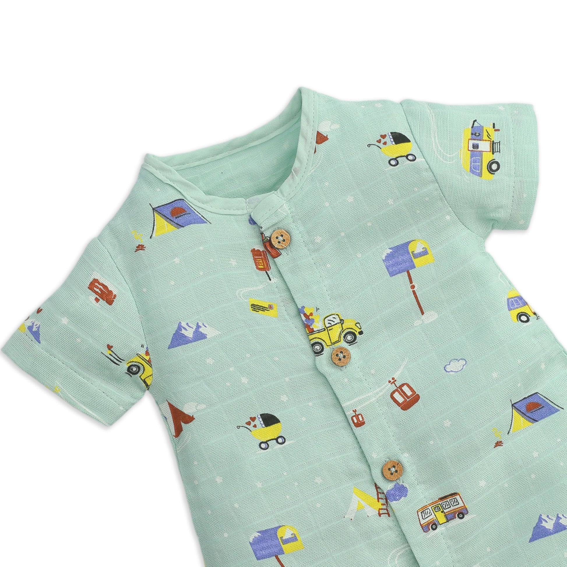 Close-up of premium muslin fabric texture and wooden button details on baby romper