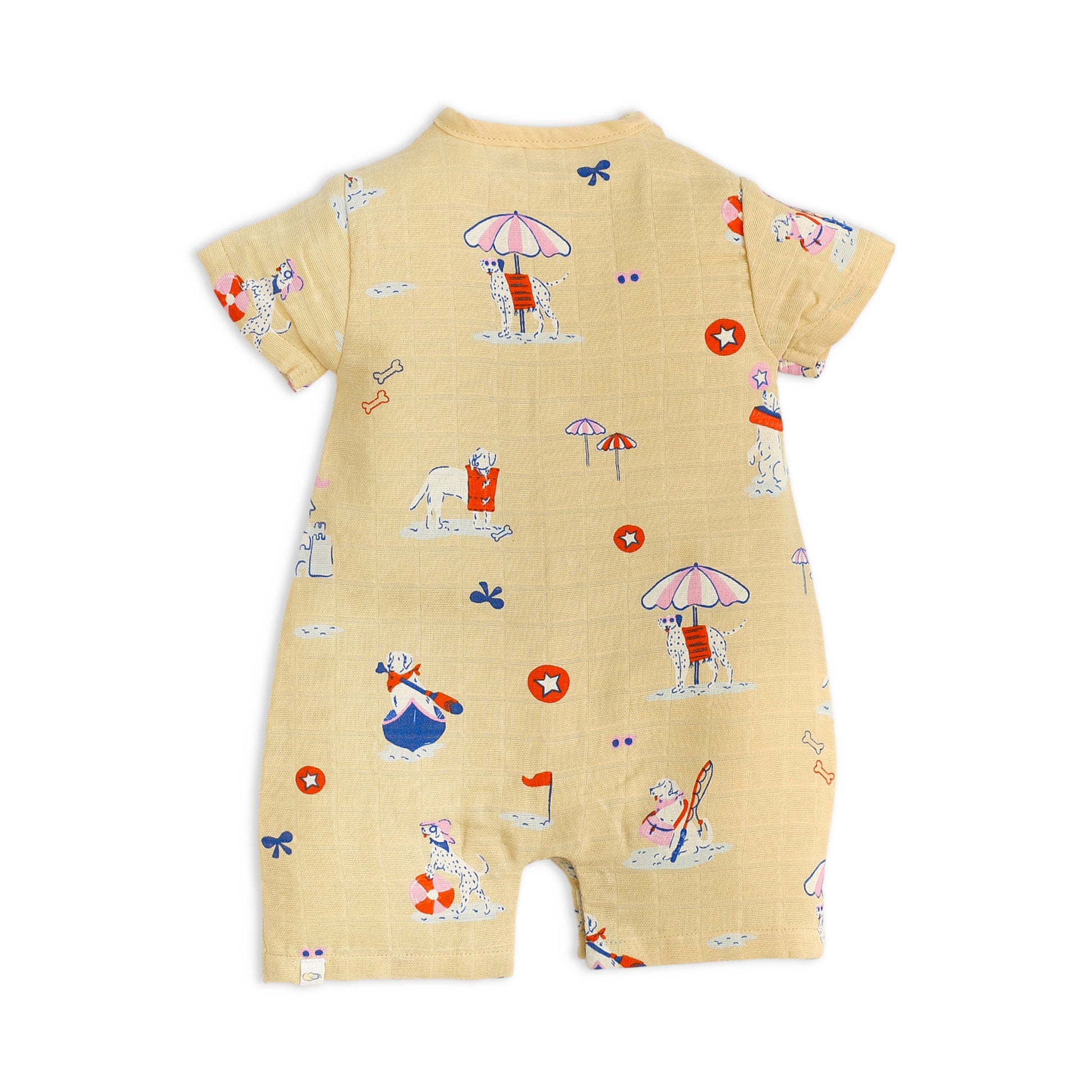 Back view of breathable muslin baby romper with all-over dog at the beach pattern